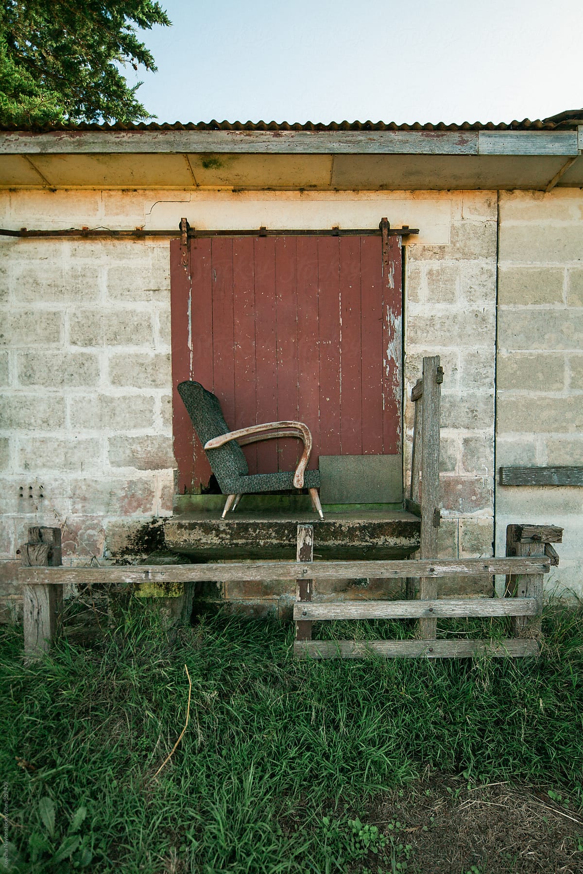 Old Chair on deck of abandoned farm
