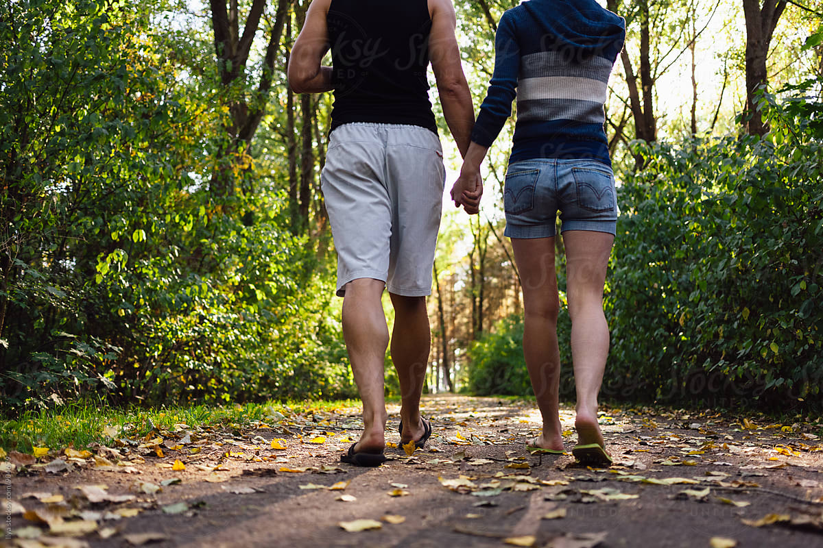 Young couple summer nature walking outdoor