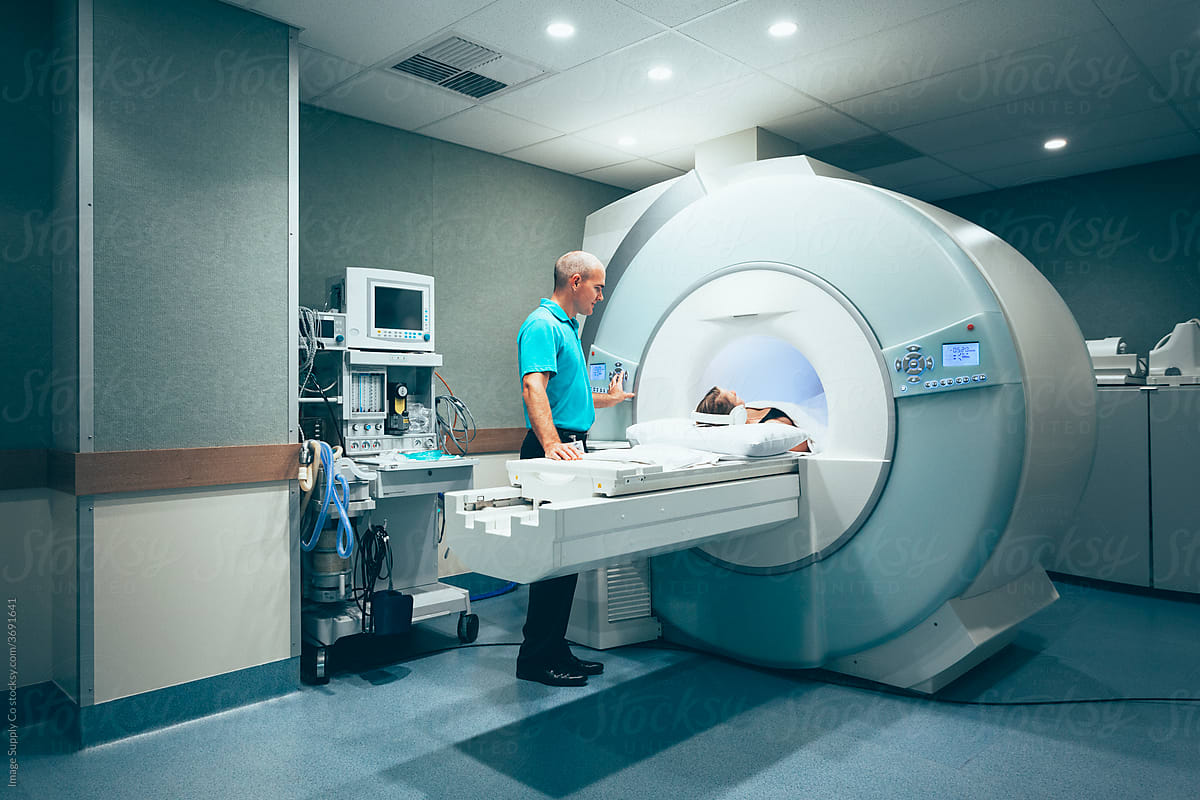 CT scanner with patient and radiologist