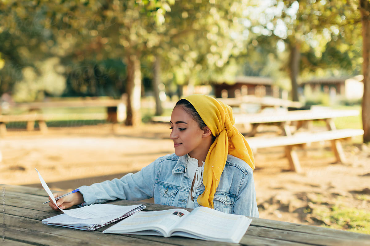 woman studying in the park