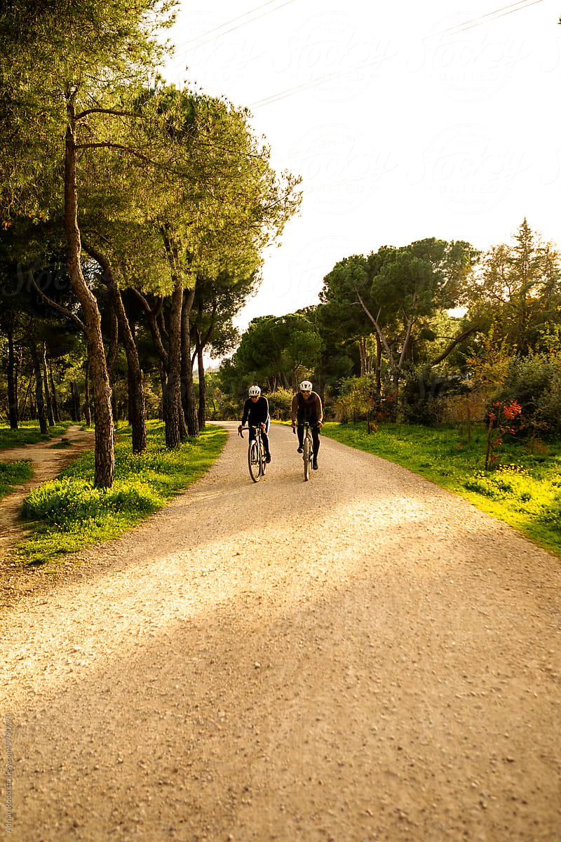 Two cyclists on gravel road