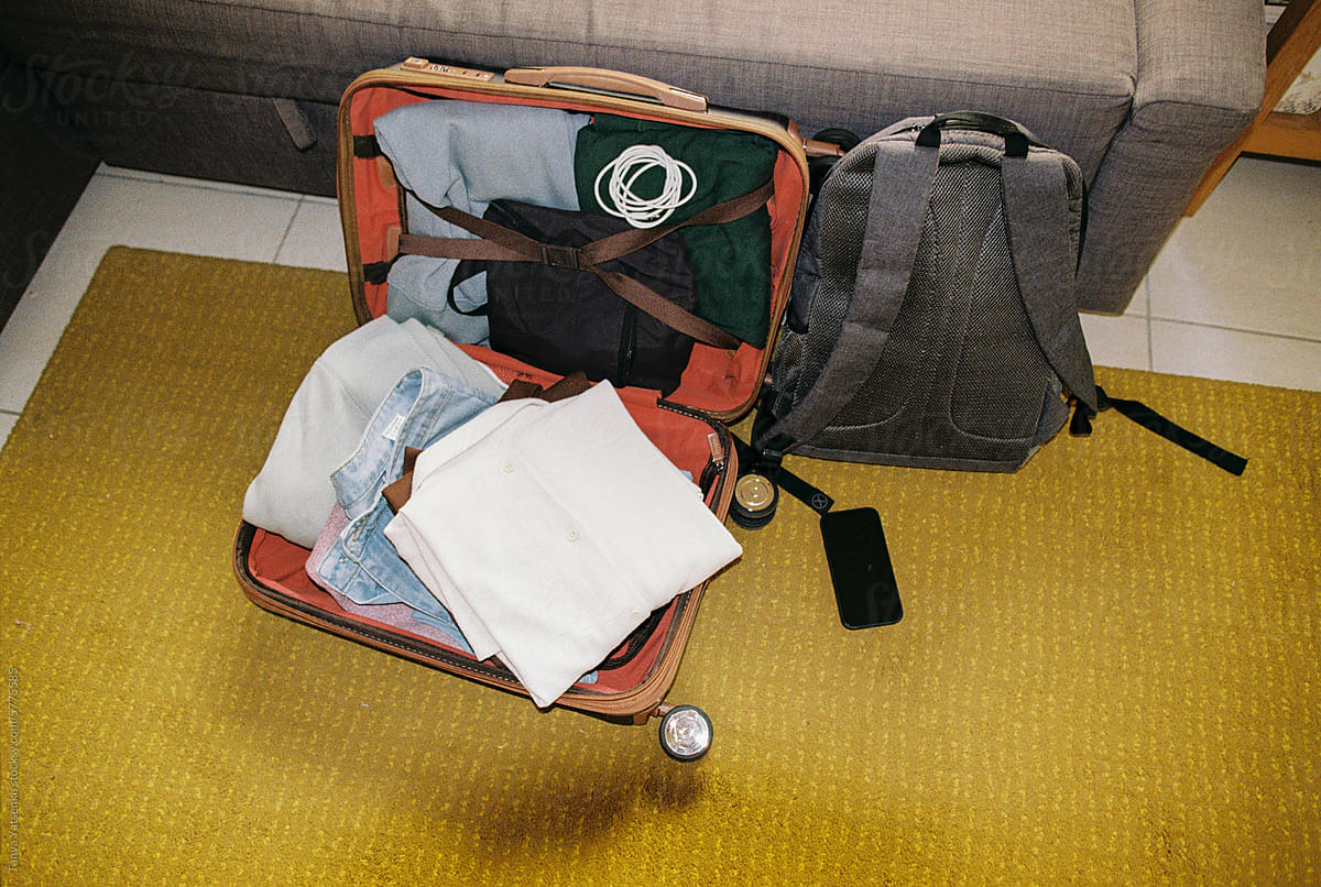 A packed open clothes in a suitcase