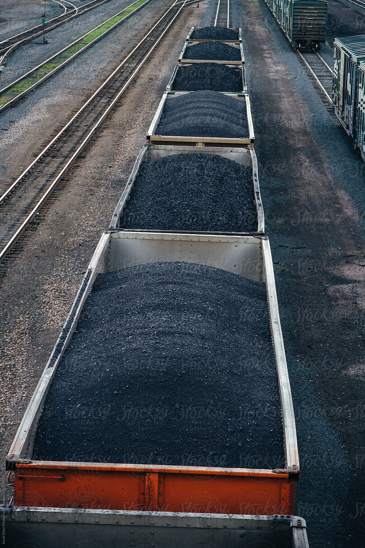 Railroad cars filled with coal.