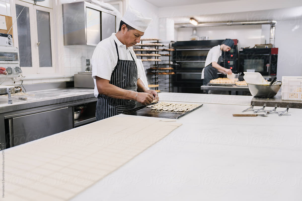 Modern Bakery Workers Preparing Pastry