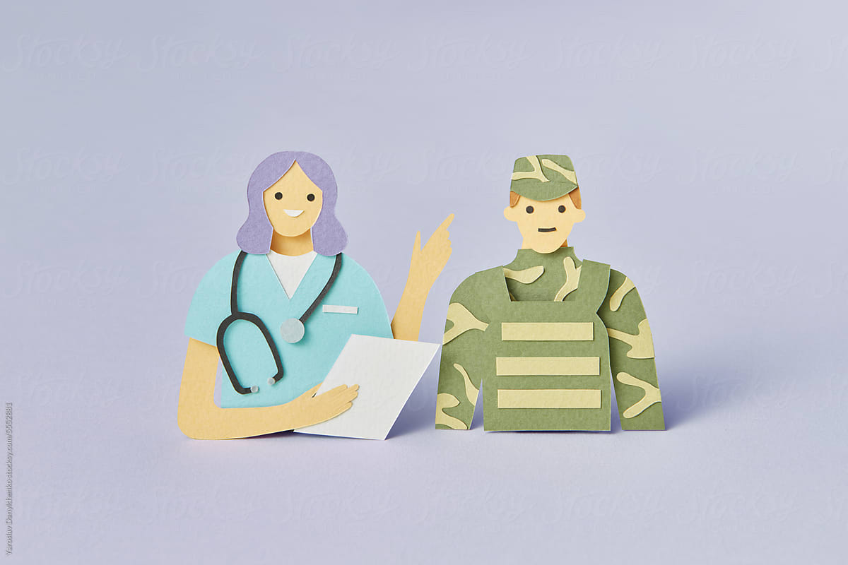 Paper image of soldier talking to doctor.