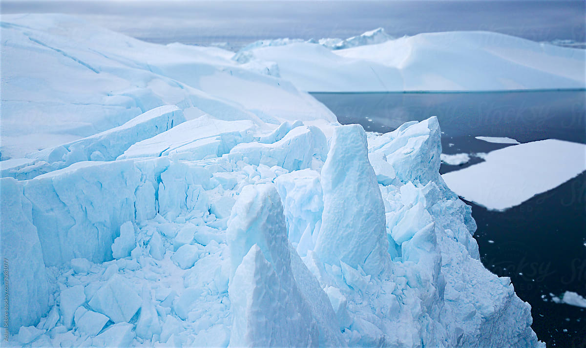 Beautiful Greenland iceberg cracks, iconic global warming climate change landscape