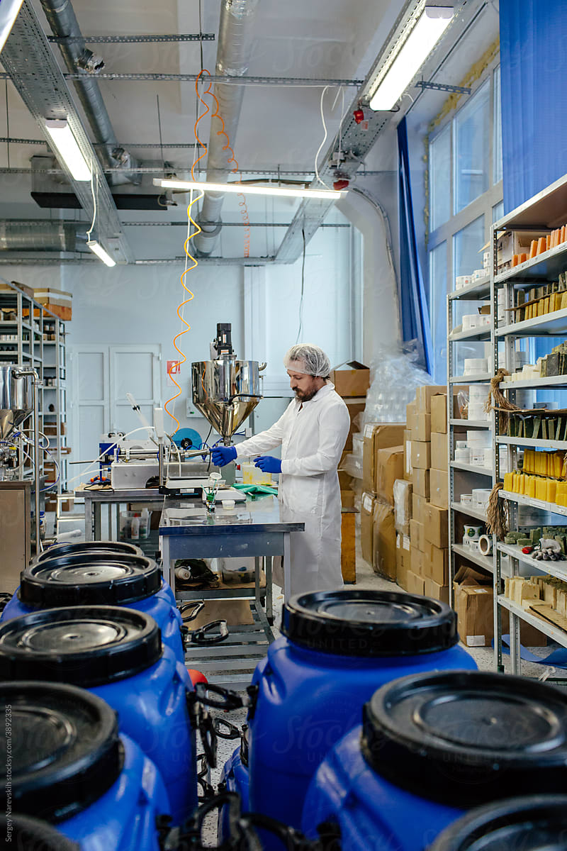 Male chemist working in lab at cosmetics plant