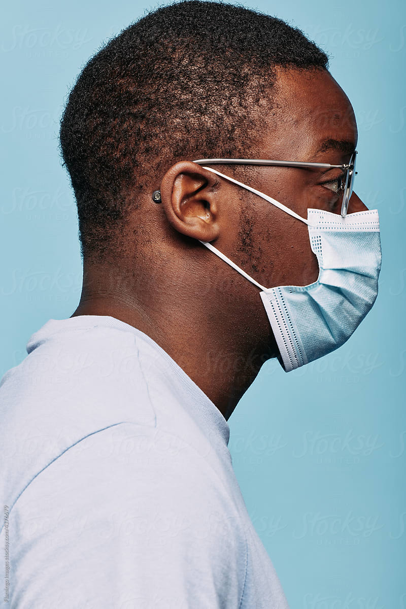 Portrait of man with mask. Black man wearing a face mask