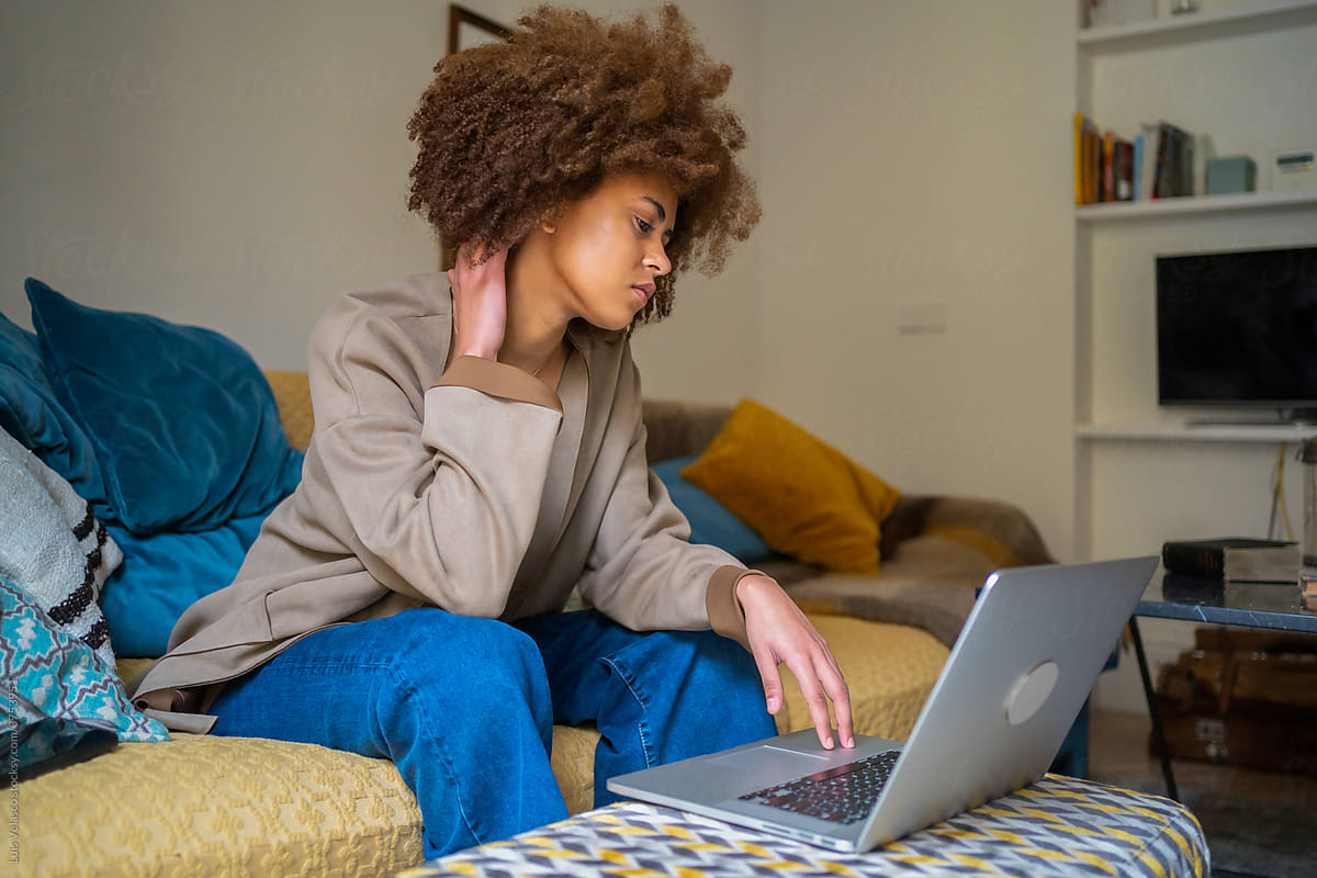 Black Woman With Laptop Having Pain In The Neck.