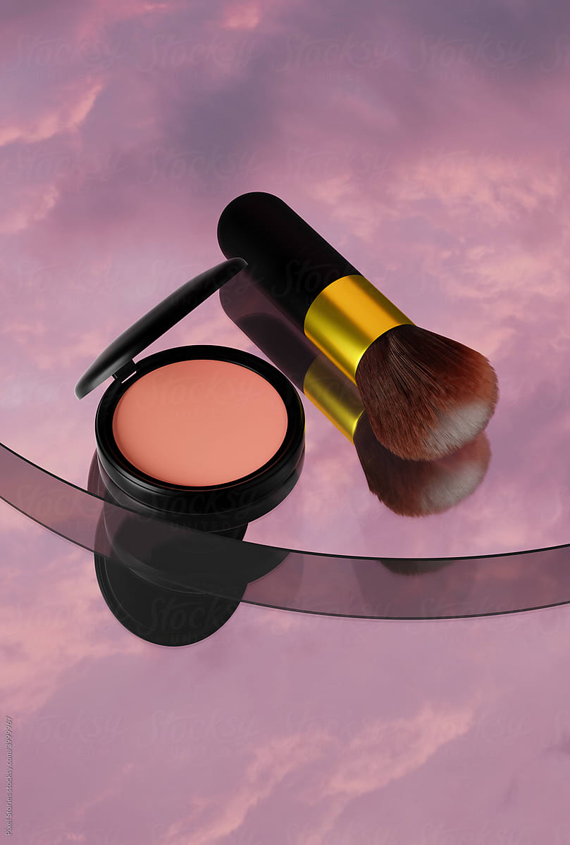 Blush face powder and make-up brush on glass