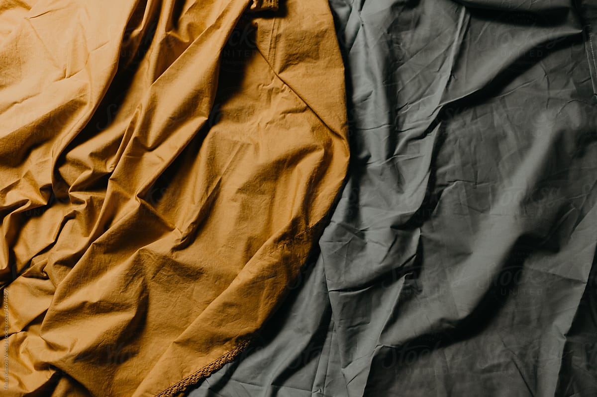 wrinkled ocher and gray cloth