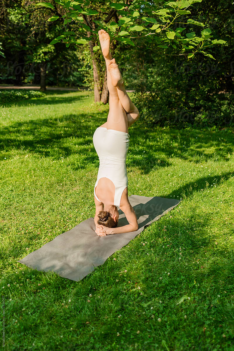 Morning Yoga Woman in White Activewear Enjoying Park Session