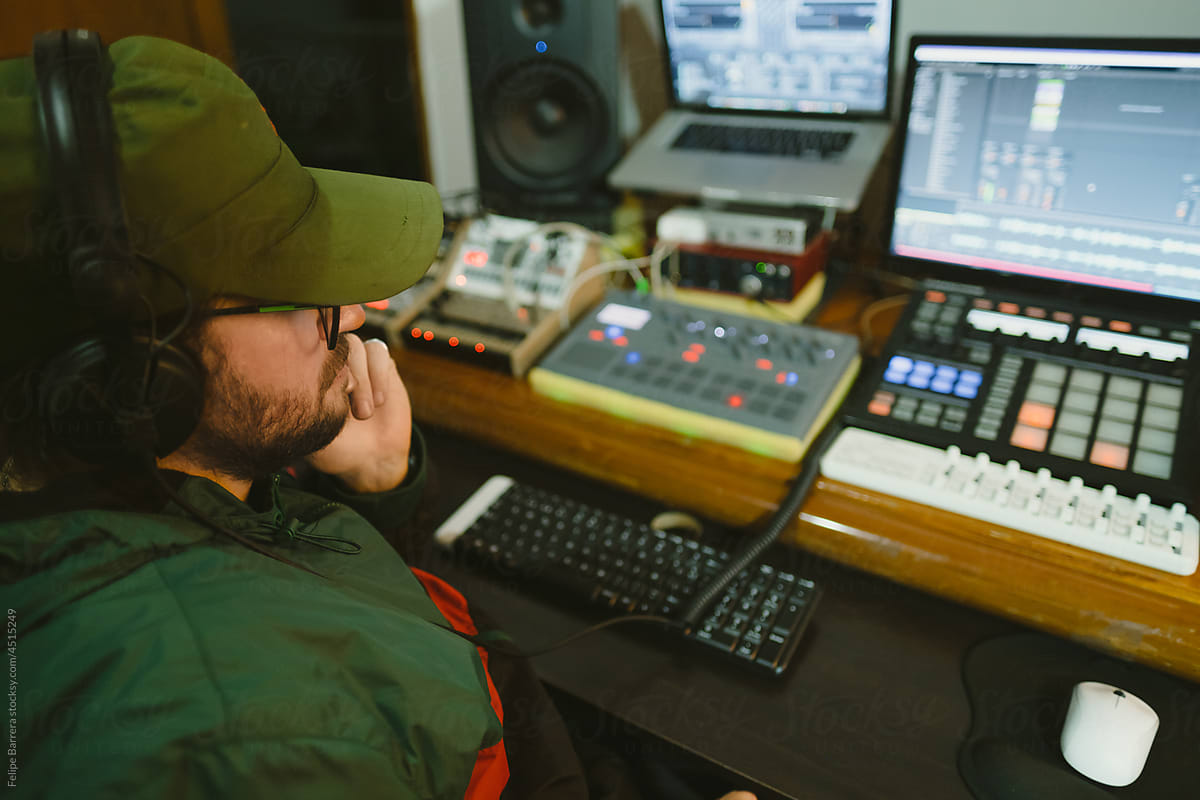 Music Producer Creating Music At His Home Studio