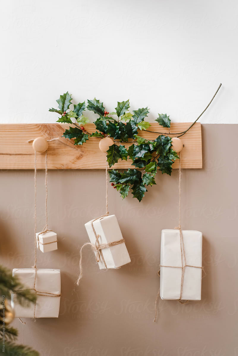 Present boxes hanging on cloth hooks neat plant branches