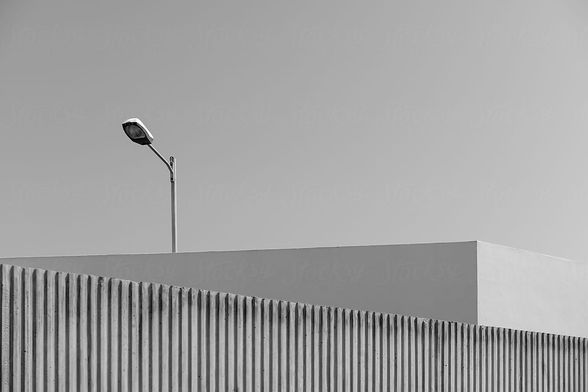 A lamppost in a minimalist scenary.