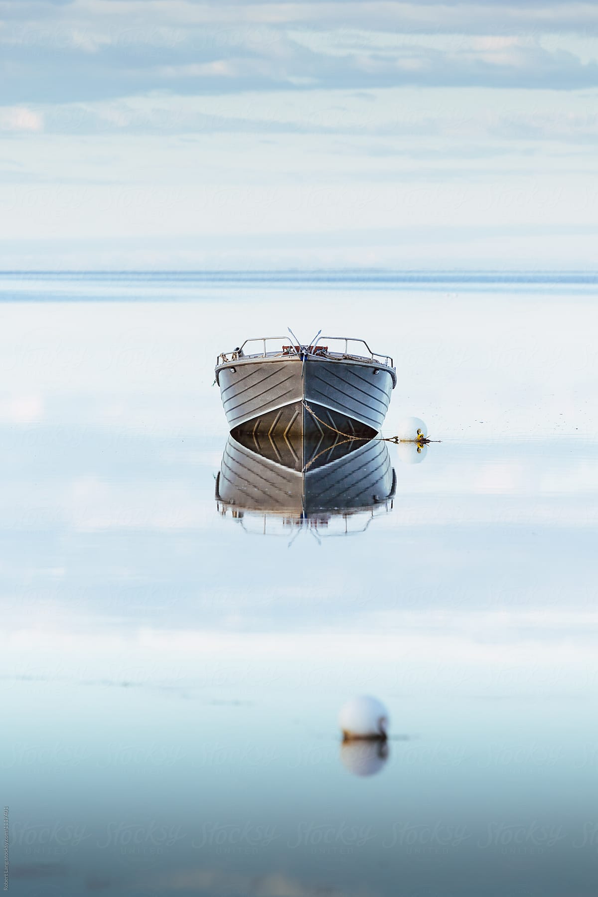 Small boat on a calm cool morning