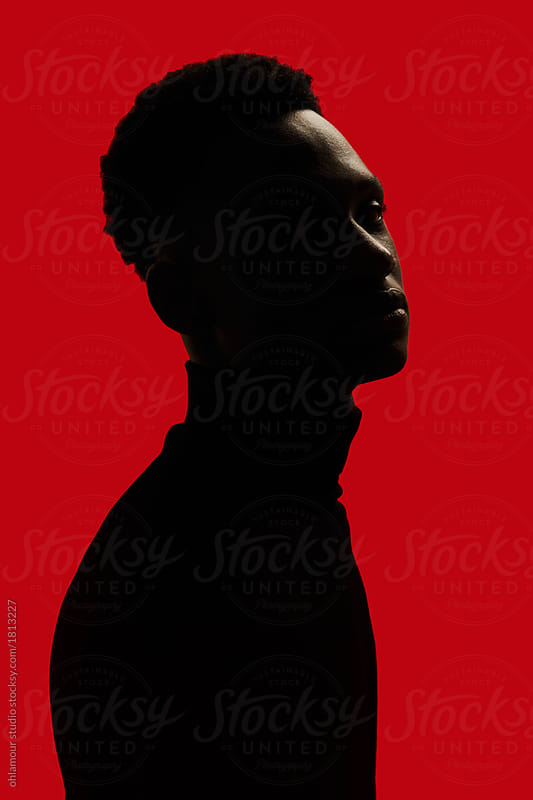 African American man silhouette isolated over red background - Black / Red