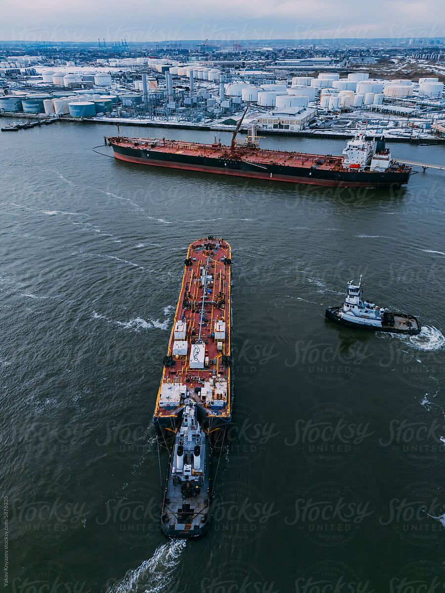 Maritime Coordination: Tugboats and Tanker