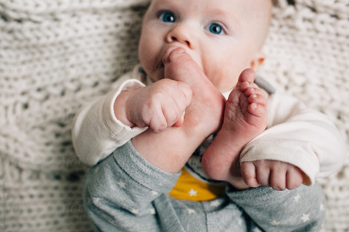 &amp;quot;Baby Sucking On His Toes&amp;quot; by Stocksy Contributor &amp;quot;Kelly Knox&amp;quot; - Stocksy