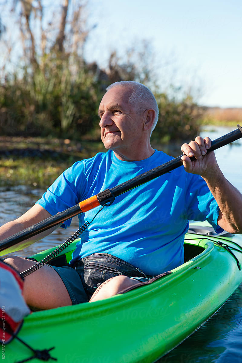 Senior man kayaking