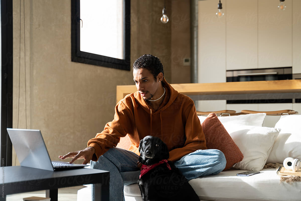 Man with dog at home