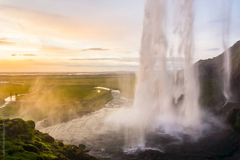 Seljalandsfoss seen from behind the waterfall at the time of sunset