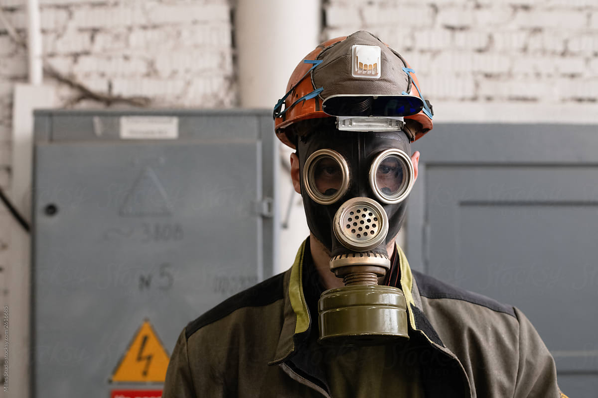 Factory worker in gas mask