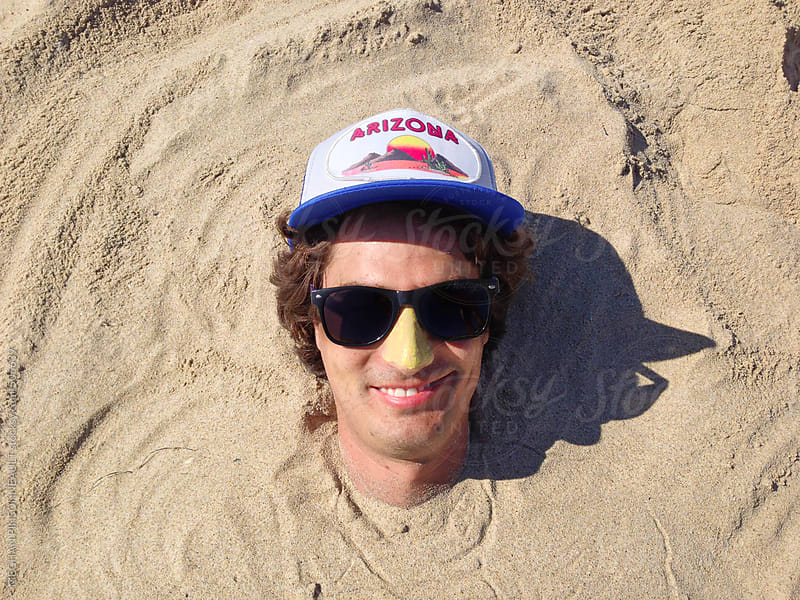 Man Wearing Sunglasses Buried in the Sand by <b>MEGHAN PINSONNEAULT</b> for Stocksy ... - 506639