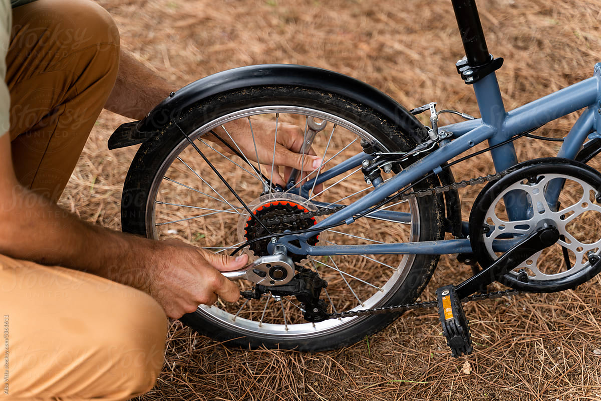 Man repair bike tire