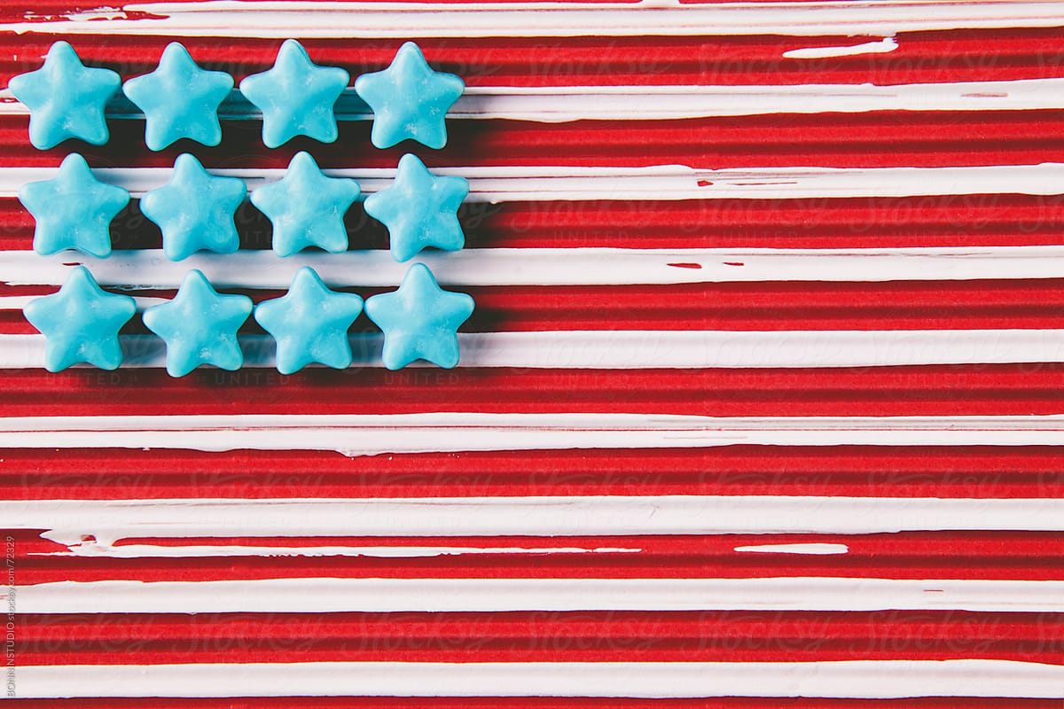 Handmade usa flag with sugar stars and painted red background.