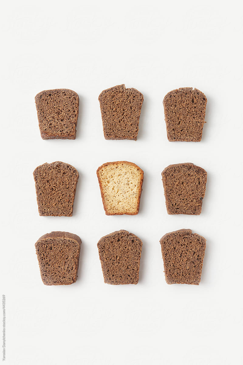 Slices of white and black wholegrain bread