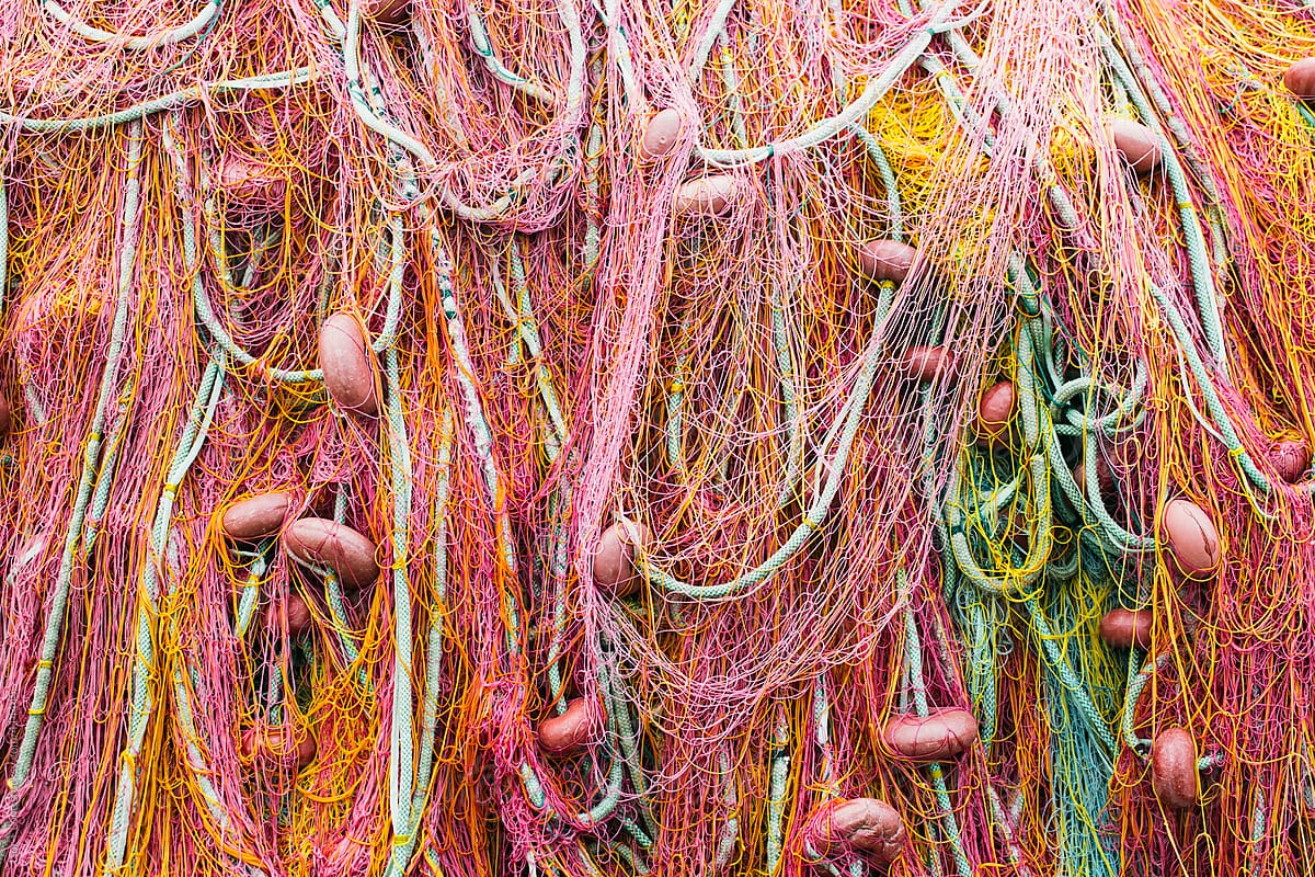 Multicolour commercial fishing net in a big pile