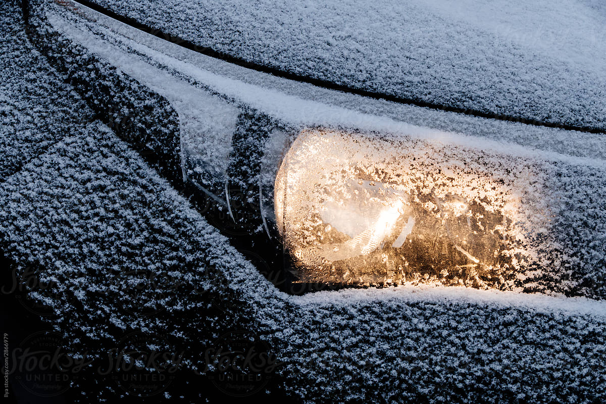 Frozen winter car snow light