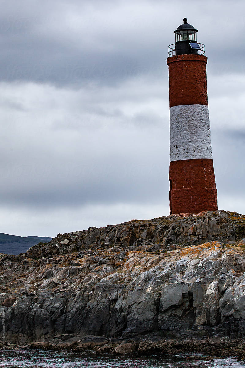 A Rugged Red and White Lighthouse