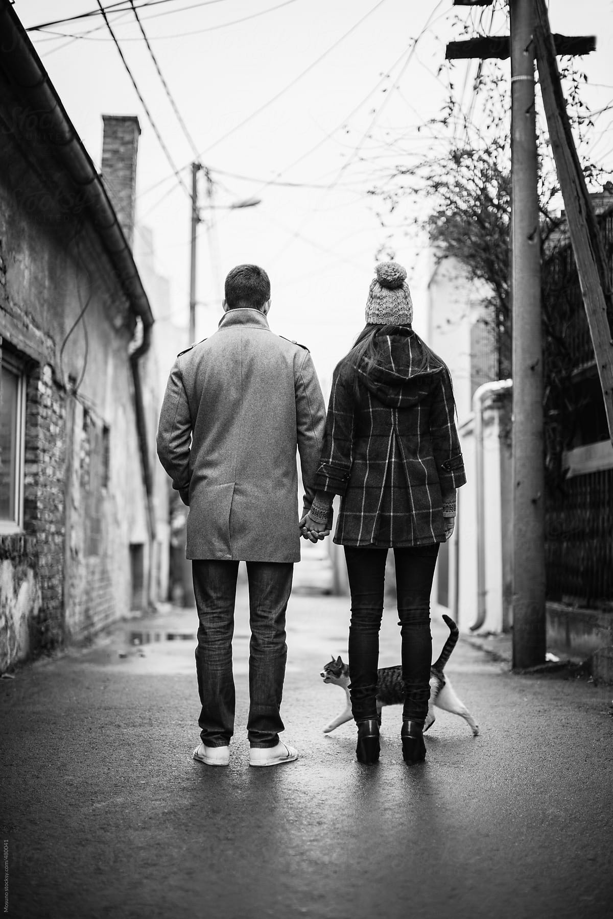 Couple Walking Down the Street