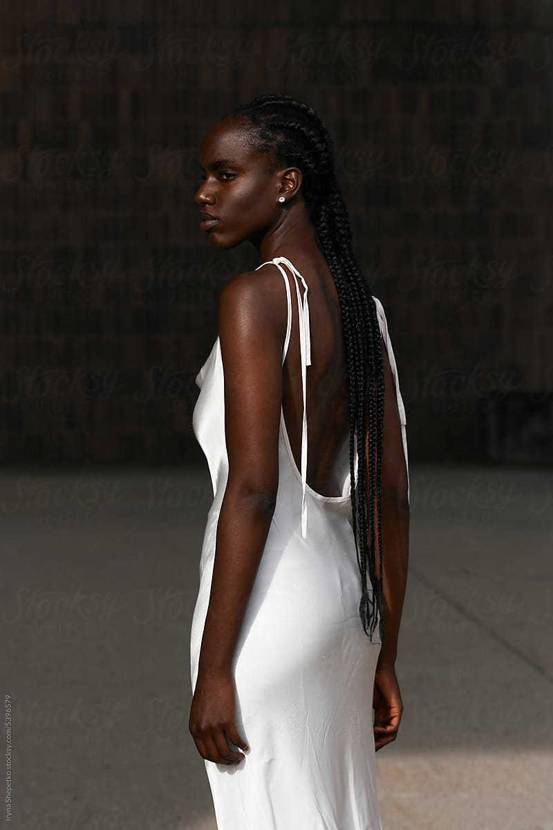 African American Woman Fashion Portrait in white dress