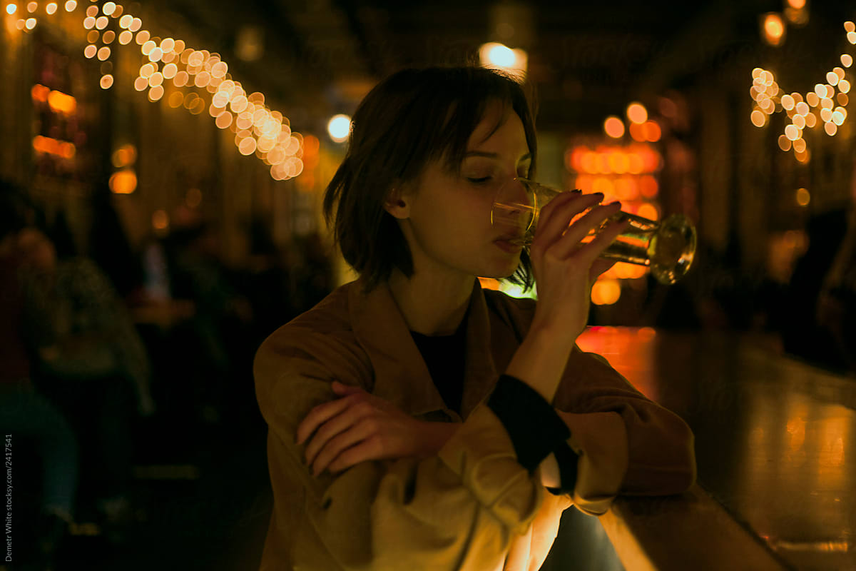 girl drinking alcohol in the bar
