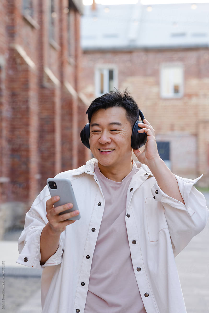 Guy enjoying listening to music