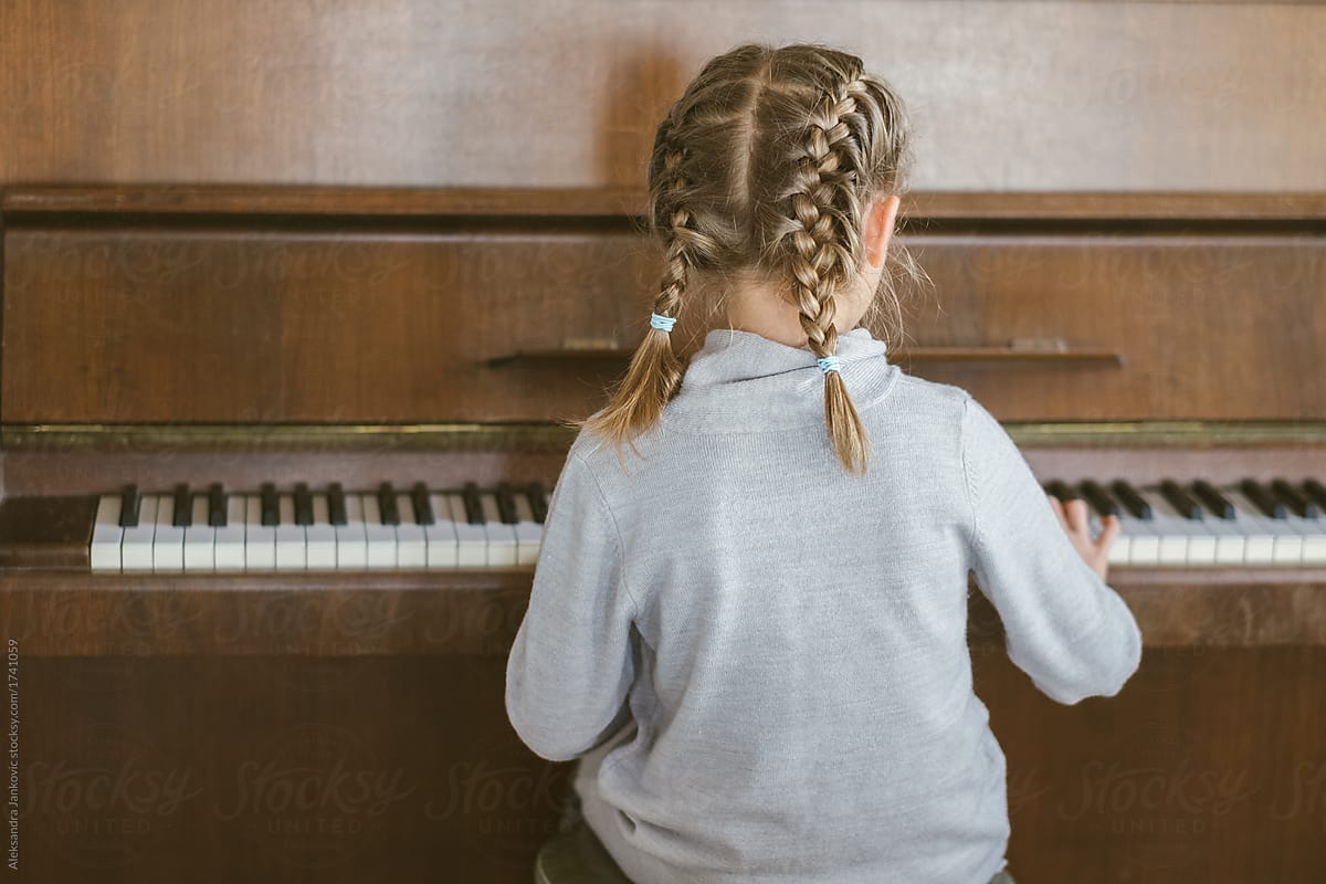 Anonymous Little Girl Playing The Piano