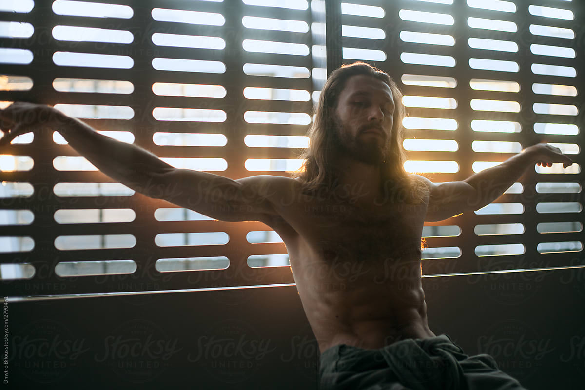 man with naked\
beautiful body, long hair and beard. posing emaciated like a crucified jesus