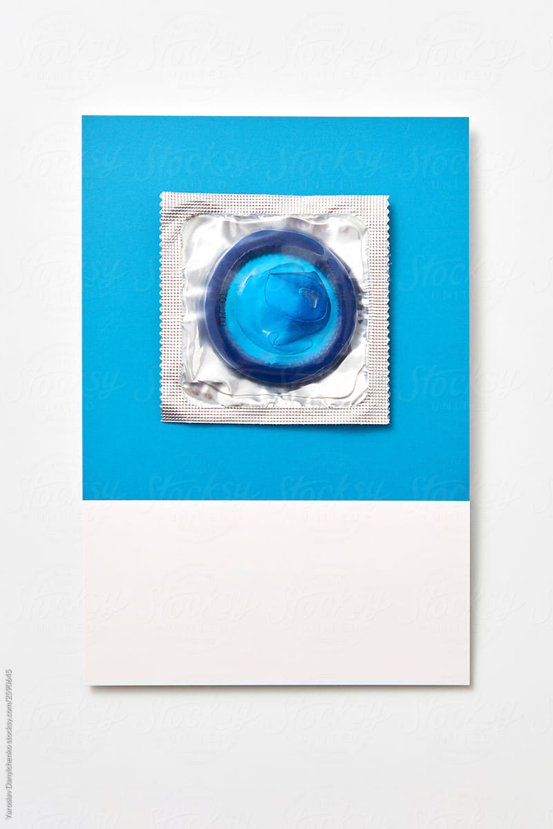 Blue card with condom pack.