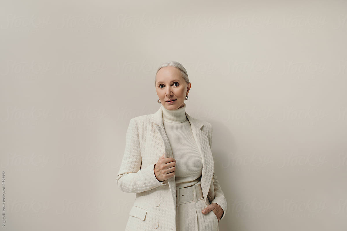 Confident businesswoman portrait in white blazer