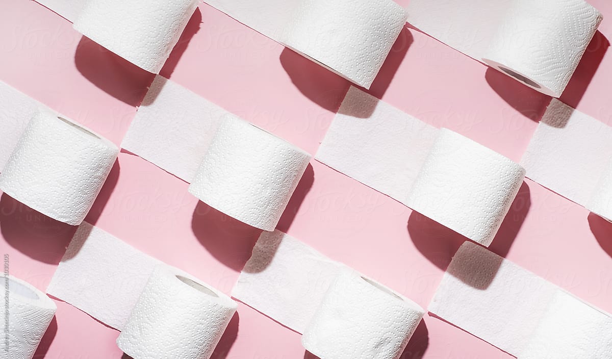 Toilet Paper Rolls On Pink Background. by Stocksy Contributor AUDSHULE