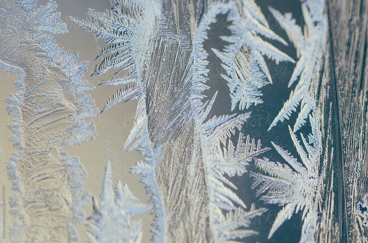 Ice crystals pattern on window in the morning