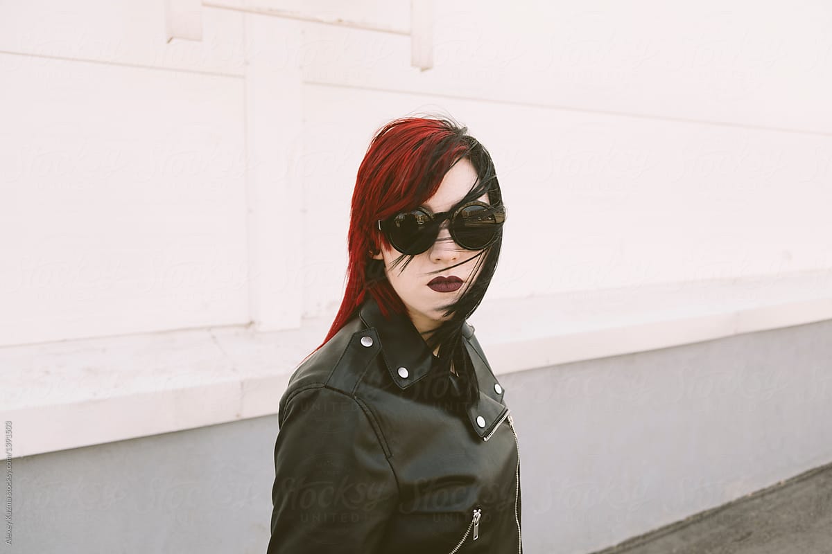 punk woman with round sunglasses