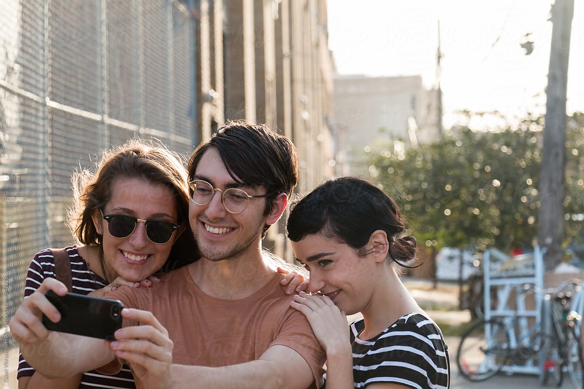 Three Friends Taking A Selfie By Stocksy Contributor Vero Stocksy