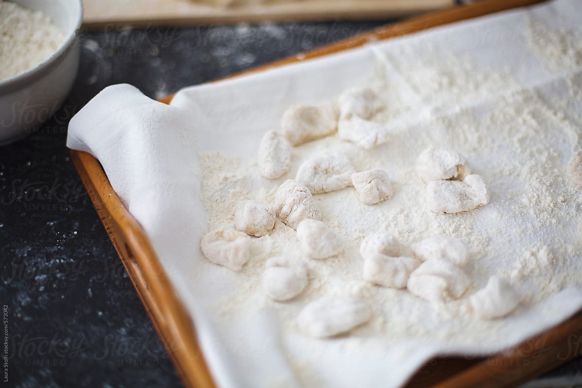 FReshly made italian gnocchi on cotton canvas with flour