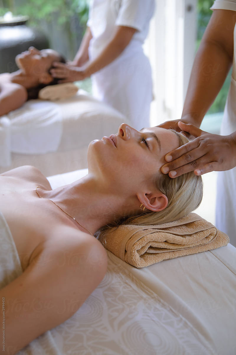 Two Women Getting Head Massages Together at spa