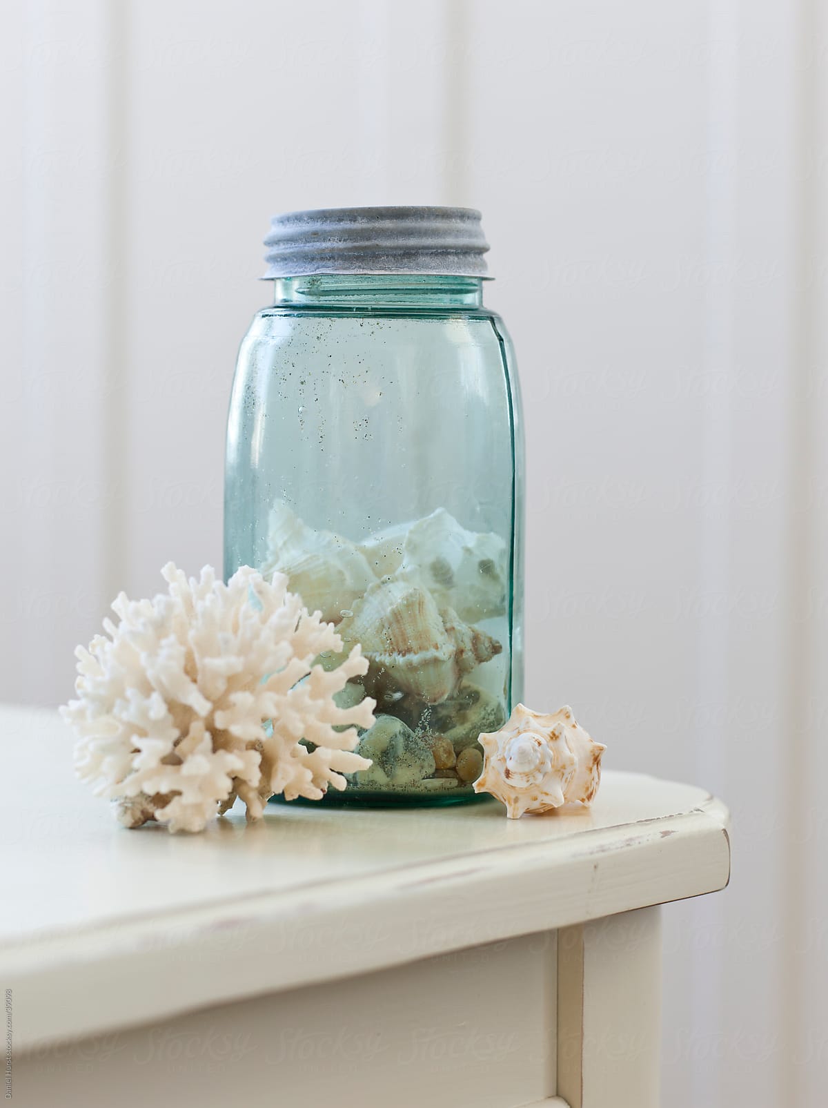 Jar of shells and coral
