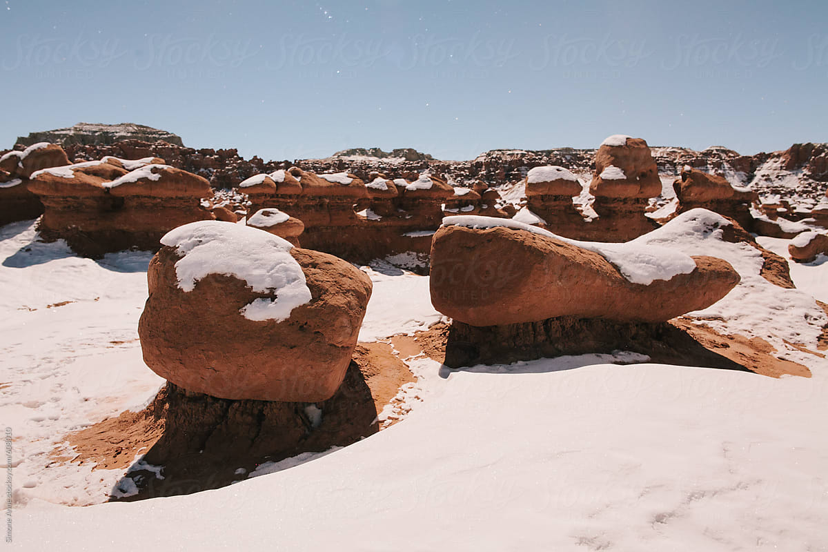 Red rocks in a snowy landscape Goblin Valley